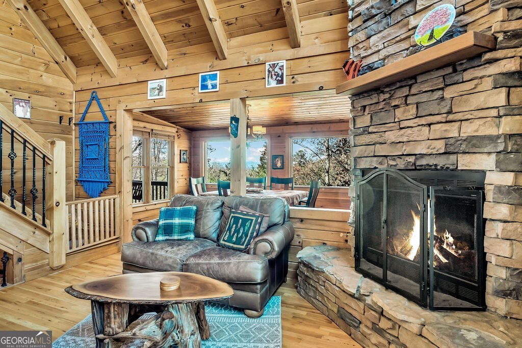 116 Channing Ridge Road, Unit 10 Morganton, GA 30560 - Photo 9 of 62 a living room with furniture and a fireplace