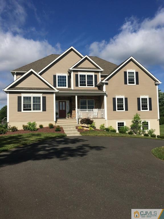 17 Thompson Grove Road Freehold, NJ 07728 - Photo 1 of 25 a front view of a house with a garden