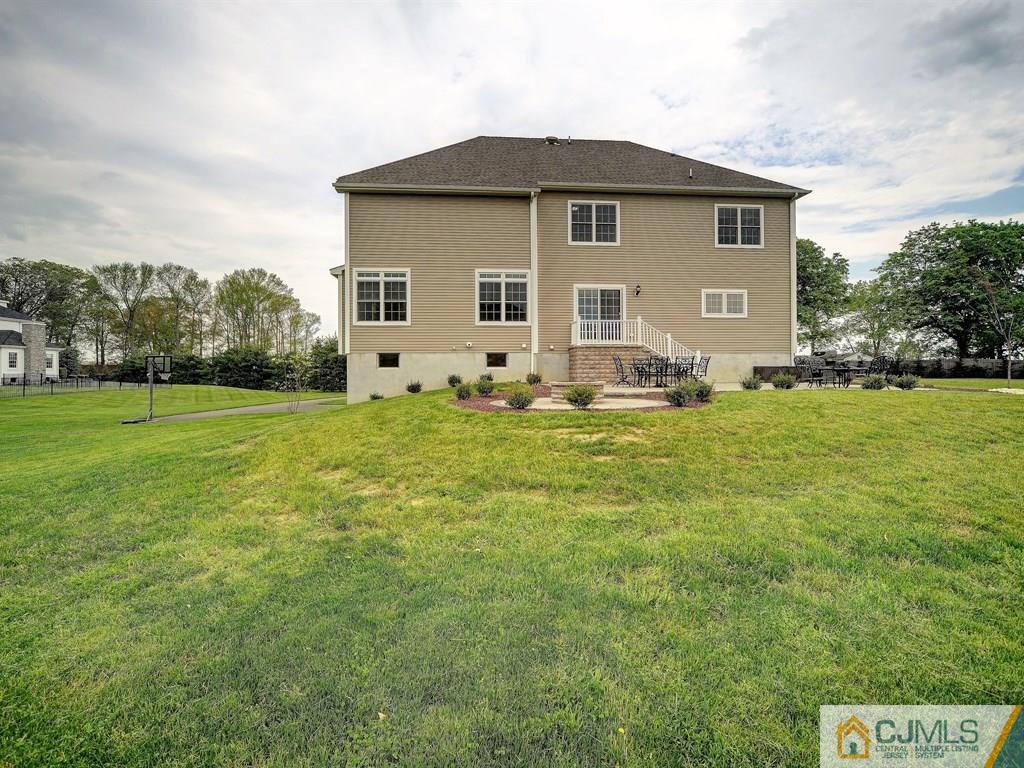 17 Thompson Grove Road Freehold, NJ 07728 - Photo 25 of 25 a view of a house with yard and front view of a house
