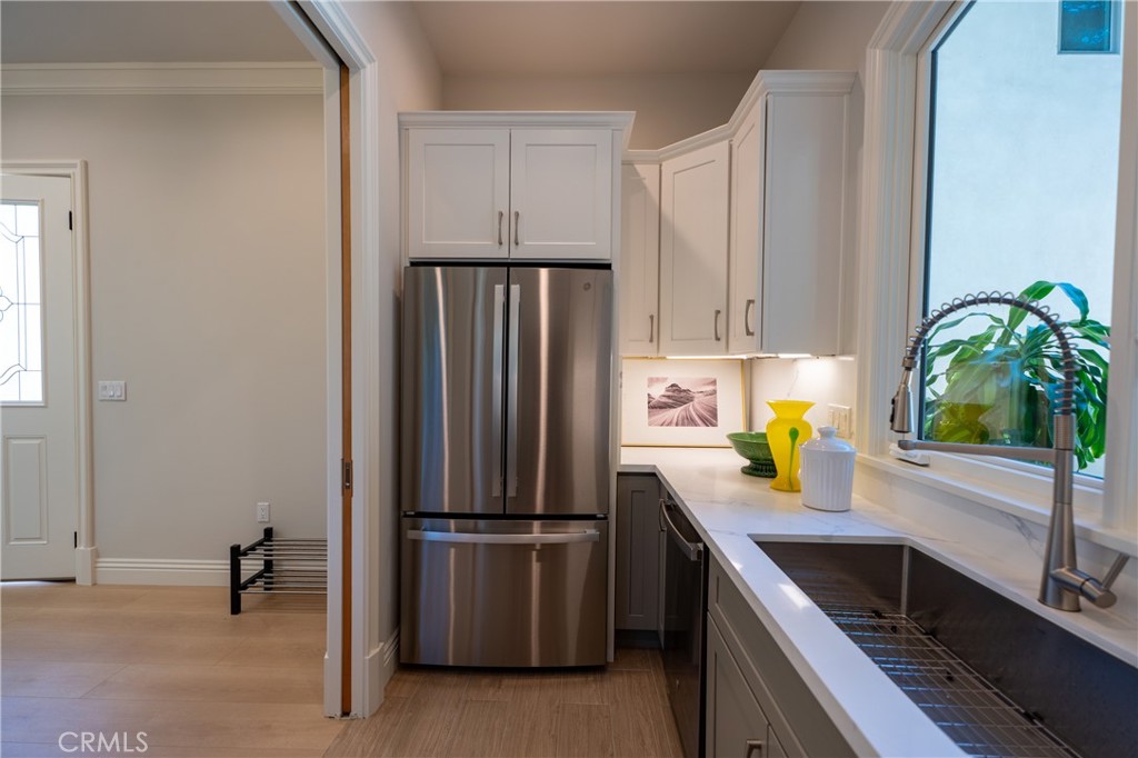894 Fallen Leaf Road Arcadia, CA 91006 - Photo 10 of 28 a kitchen with refrigerator and window