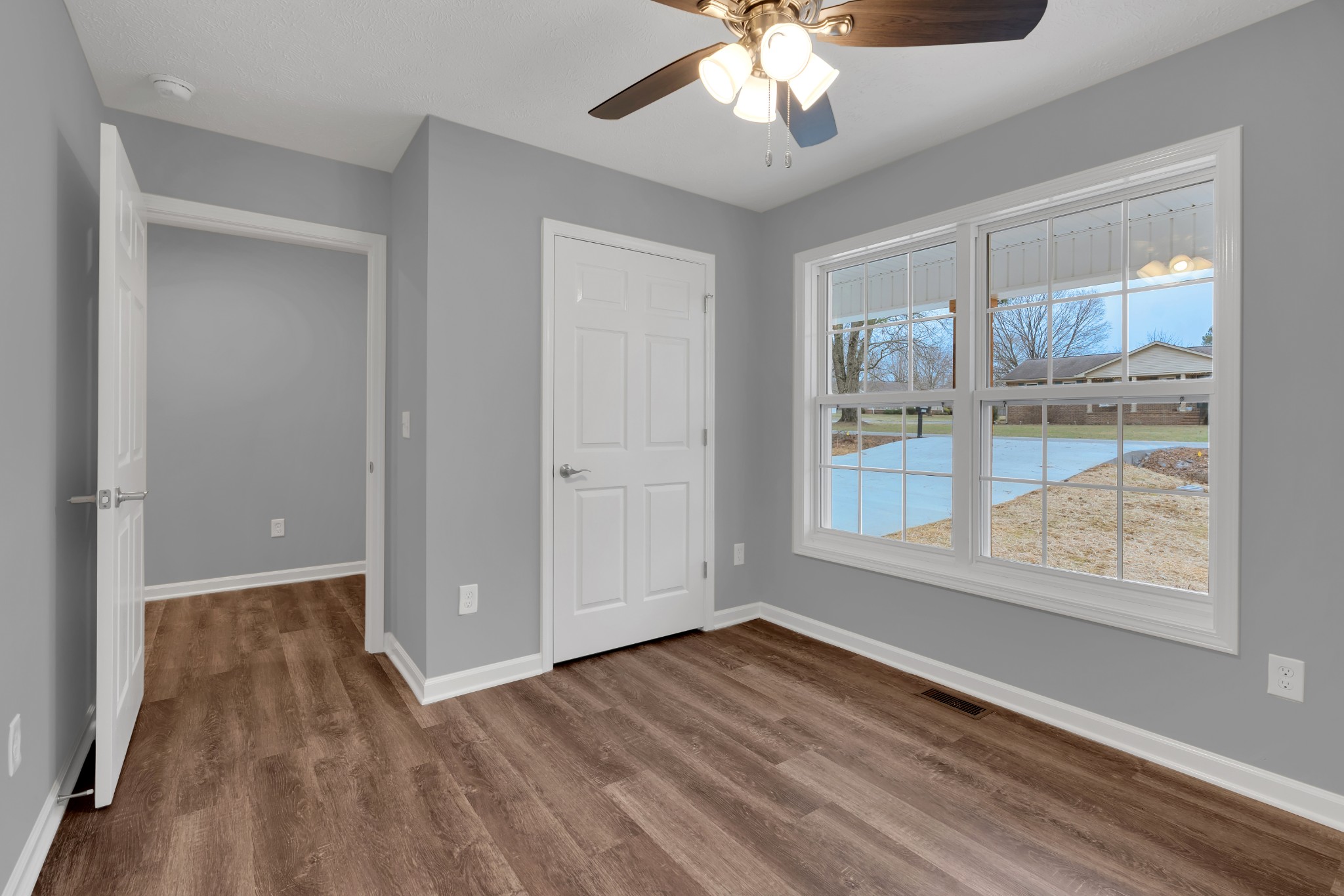 1332 Carter Blake Road Tullahoma, TN 37388 - Photo 13 of 31 wooden floor in an empty room with a window