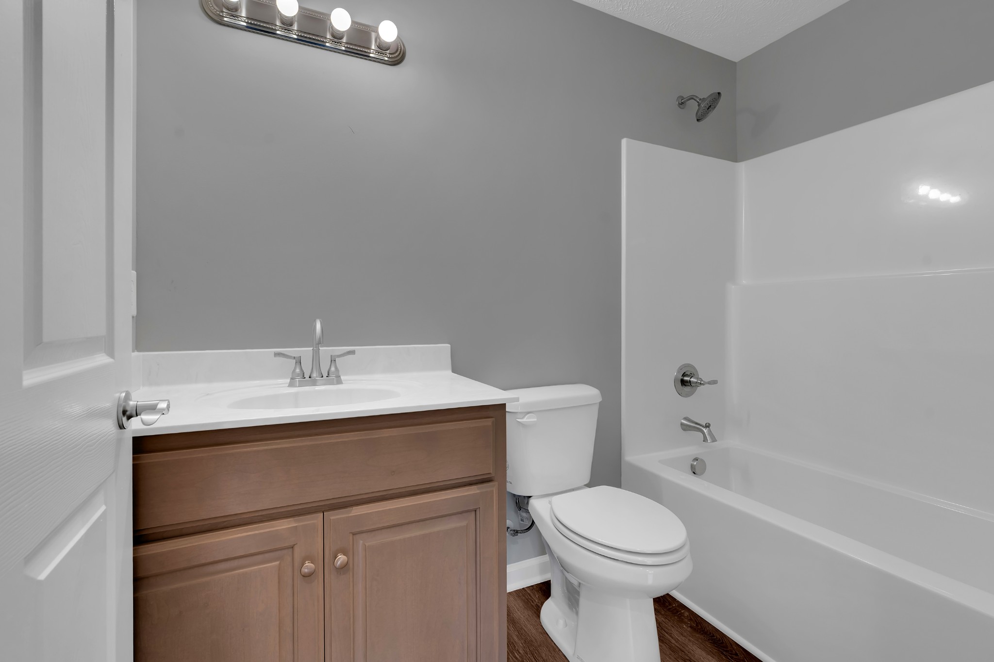 1332 Carter Blake Road Tullahoma, TN 37388 - Photo 17 of 31 a bathroom with a sink toilet and a bathtub