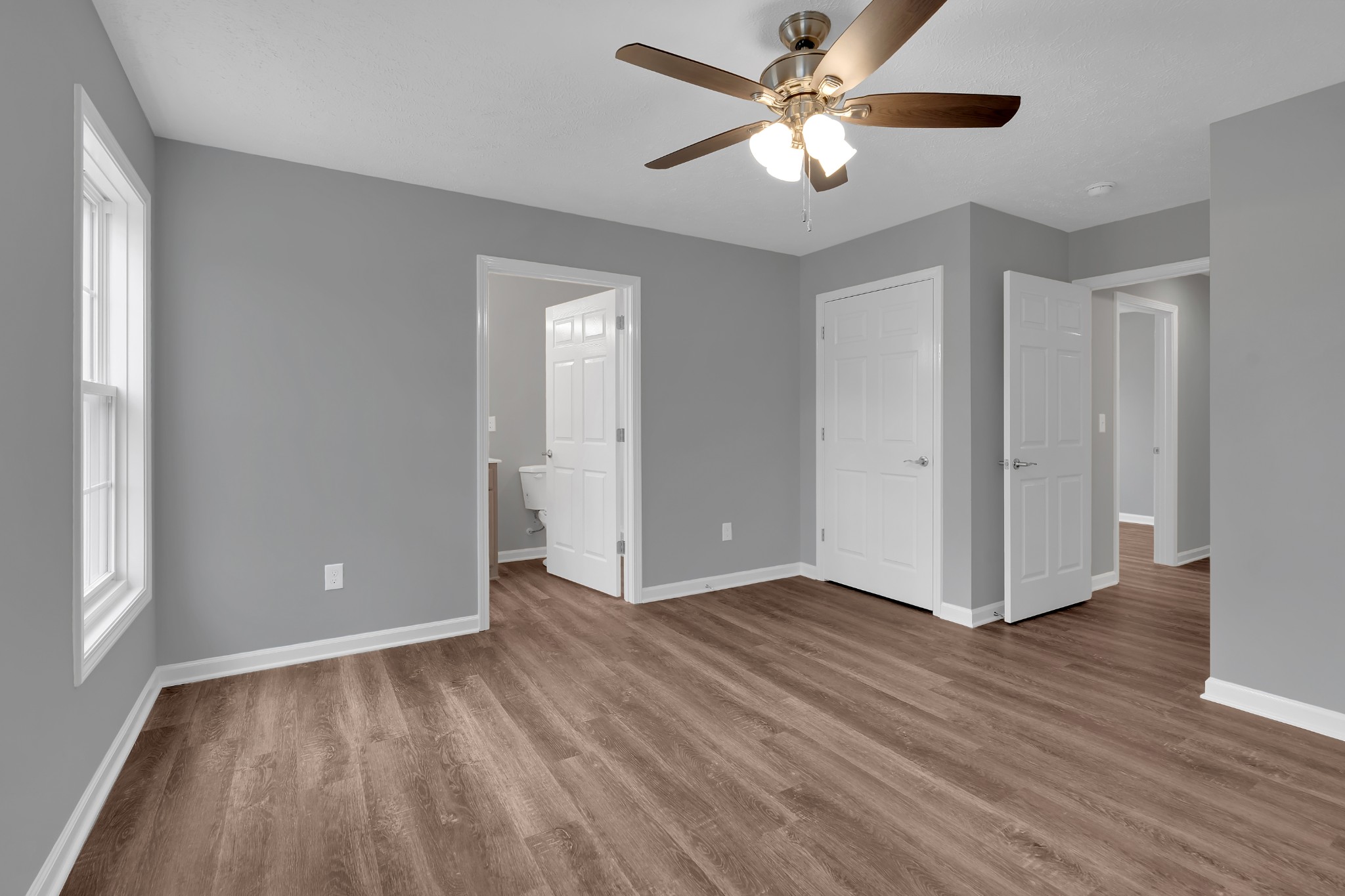 1332 Carter Blake Road Tullahoma, TN 37388 - Photo 21 of 31 wooden floor in an empty room with a window