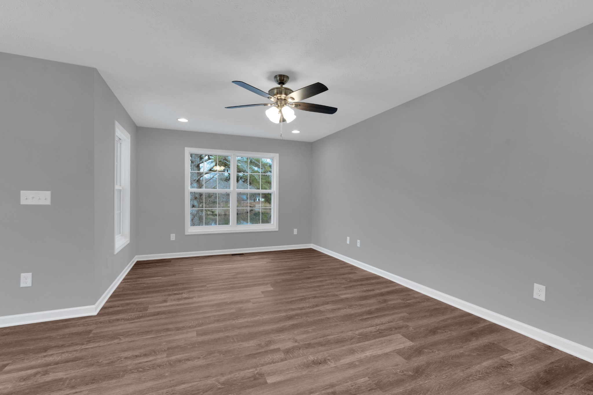 1332 Carter Blake Road Tullahoma, TN 37388 - Photo 3 of 31 wooden floor in an empty room with a window