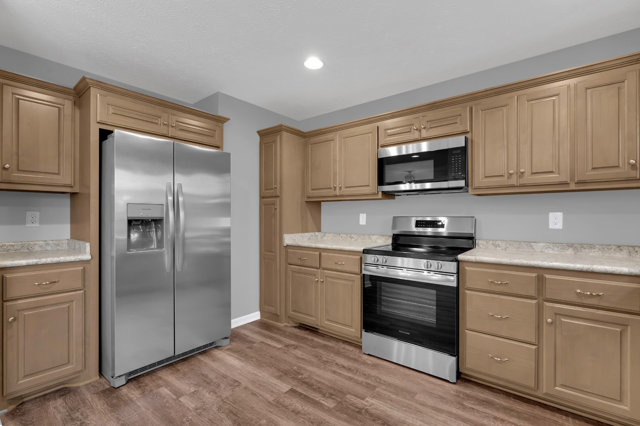 1332 Carter Blake Road Tullahoma, TN 37388 - Photo 10 of 31 a kitchen with a refrigerator stove and microwave