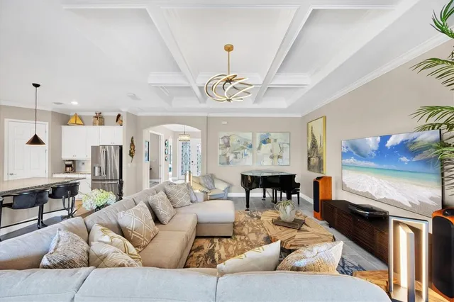 a view of a dining room with furniture and window