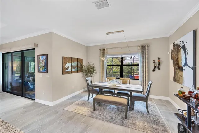 a bedroom with two beds and a flat screen tv