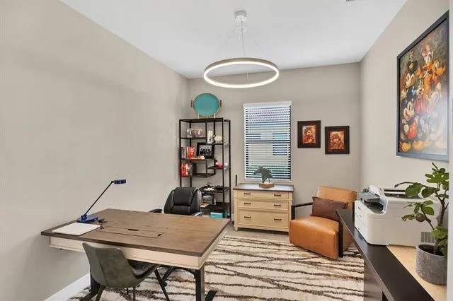a view of a porch with furniture and a yard