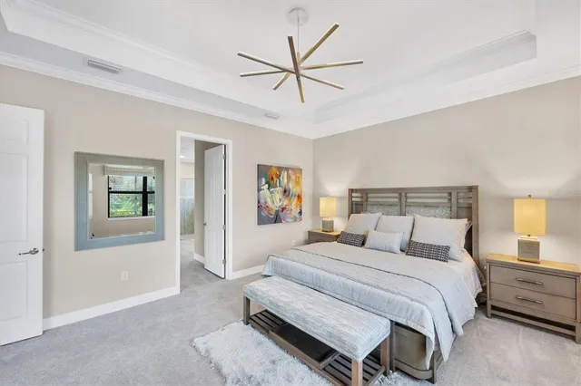 a view of a livingroom with furniture and a bookshelf