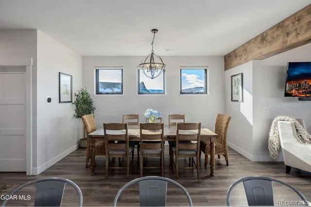 a view of a dining room with furniture