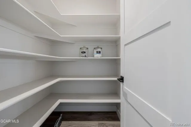 a view of utility room with empty racks