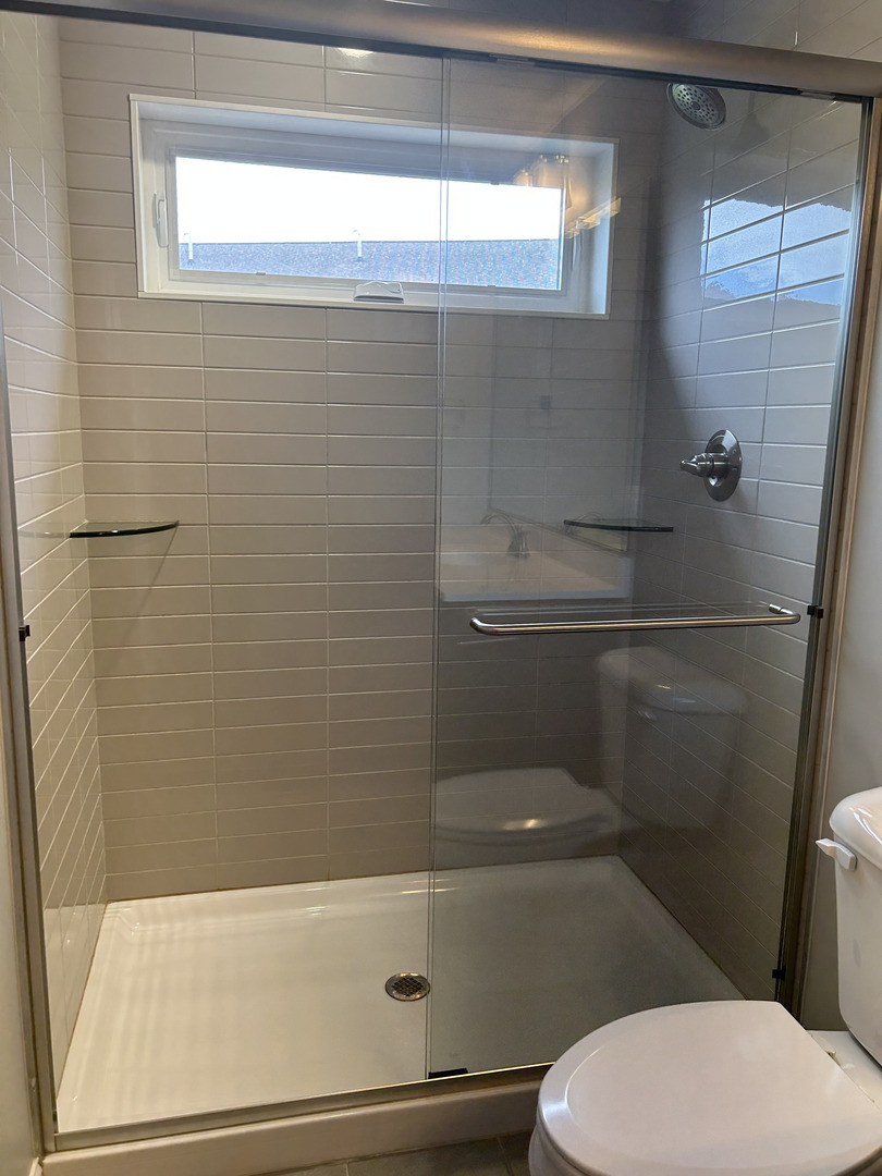 35 Winding Way Bloomington, IL 61705 - Photo 9 of 9 a bathroom with a toilet and a shower