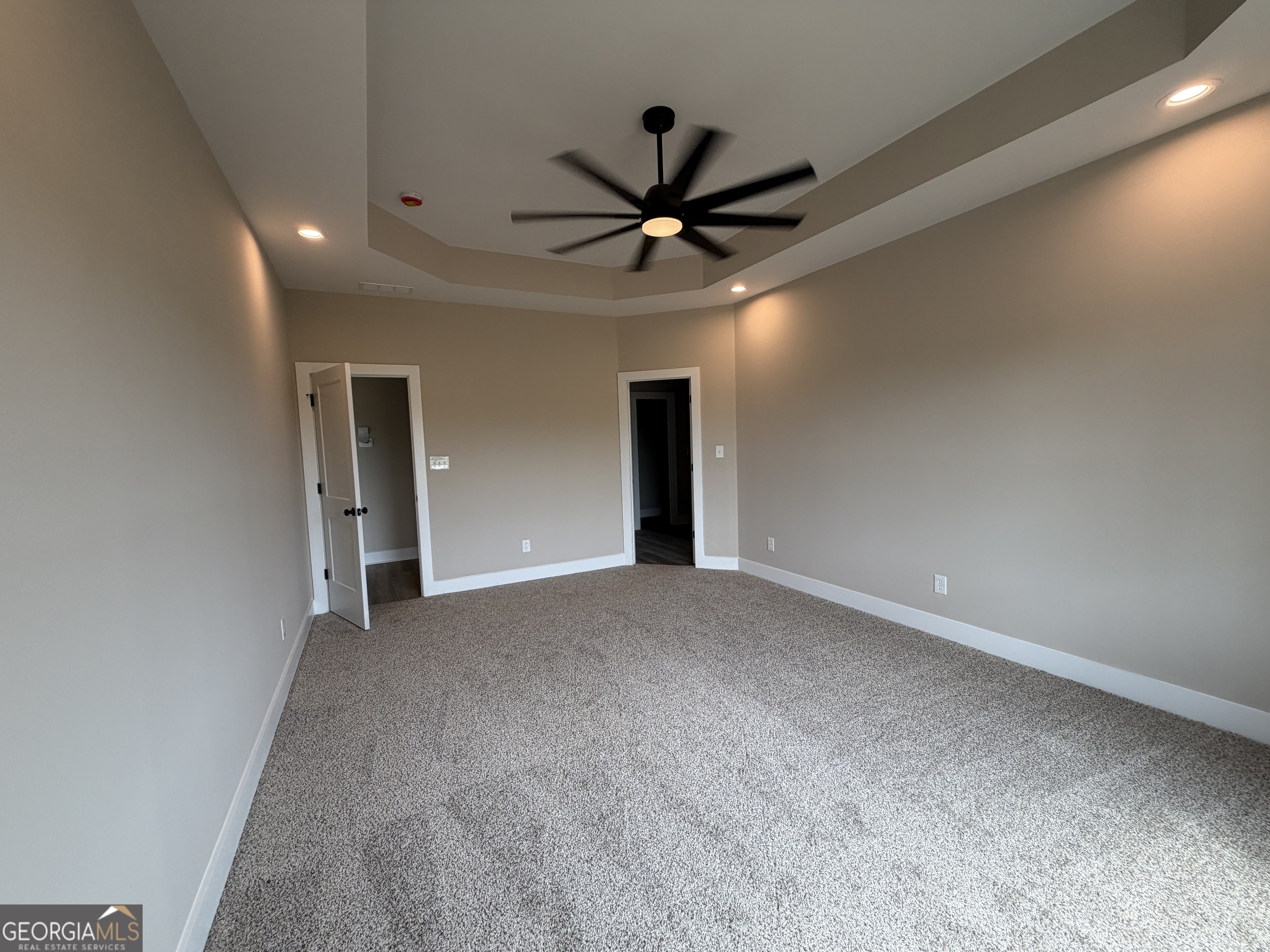 54 Melville Brown Road Williamson, GA 30292 - Photo 5 of 16 a view of a livingroom with a ceiling fan and window