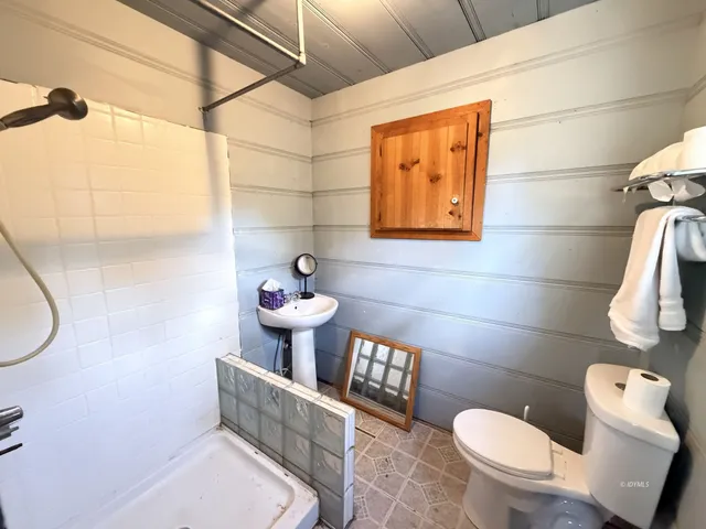 a kitchen with stainless steel appliances granite countertop a sink and a stove