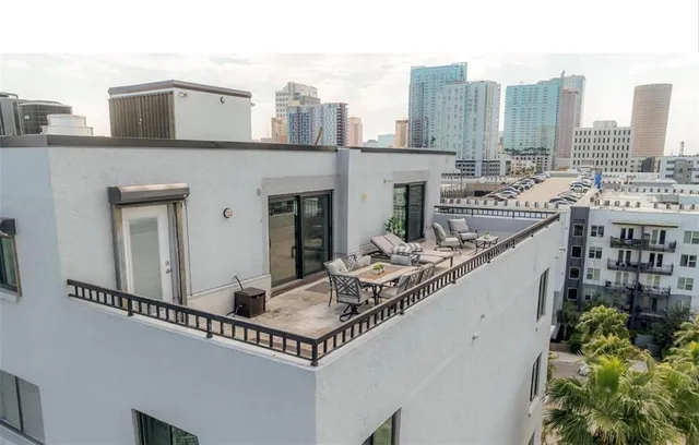 a view of a city with tall buildings