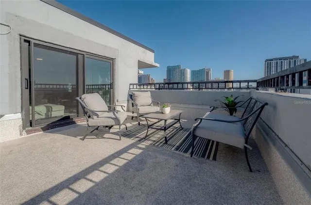 a view of a chairs and table in kitchen