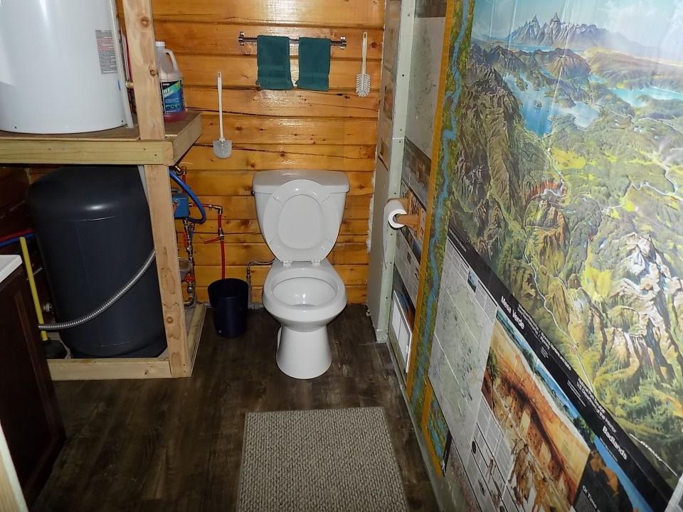 419 Osprey Road Como, CO 80432 - Photo 22 of 31 a bathroom with a toilet and a sink