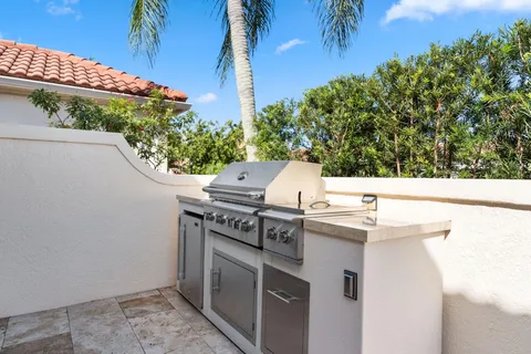 a view of kitchen with outdoor kitchen and outdoor seating