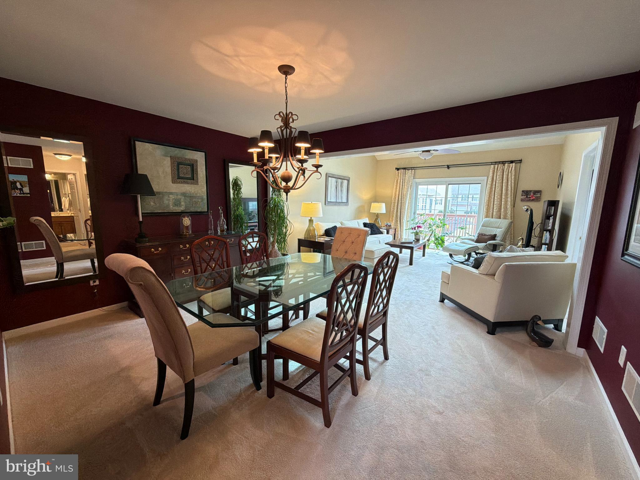 4245 Roth Farm Village Circle Mechanicsburg, PA 17050 - Photo 11 of 42 a view of a dining room with furniture and chandelier
