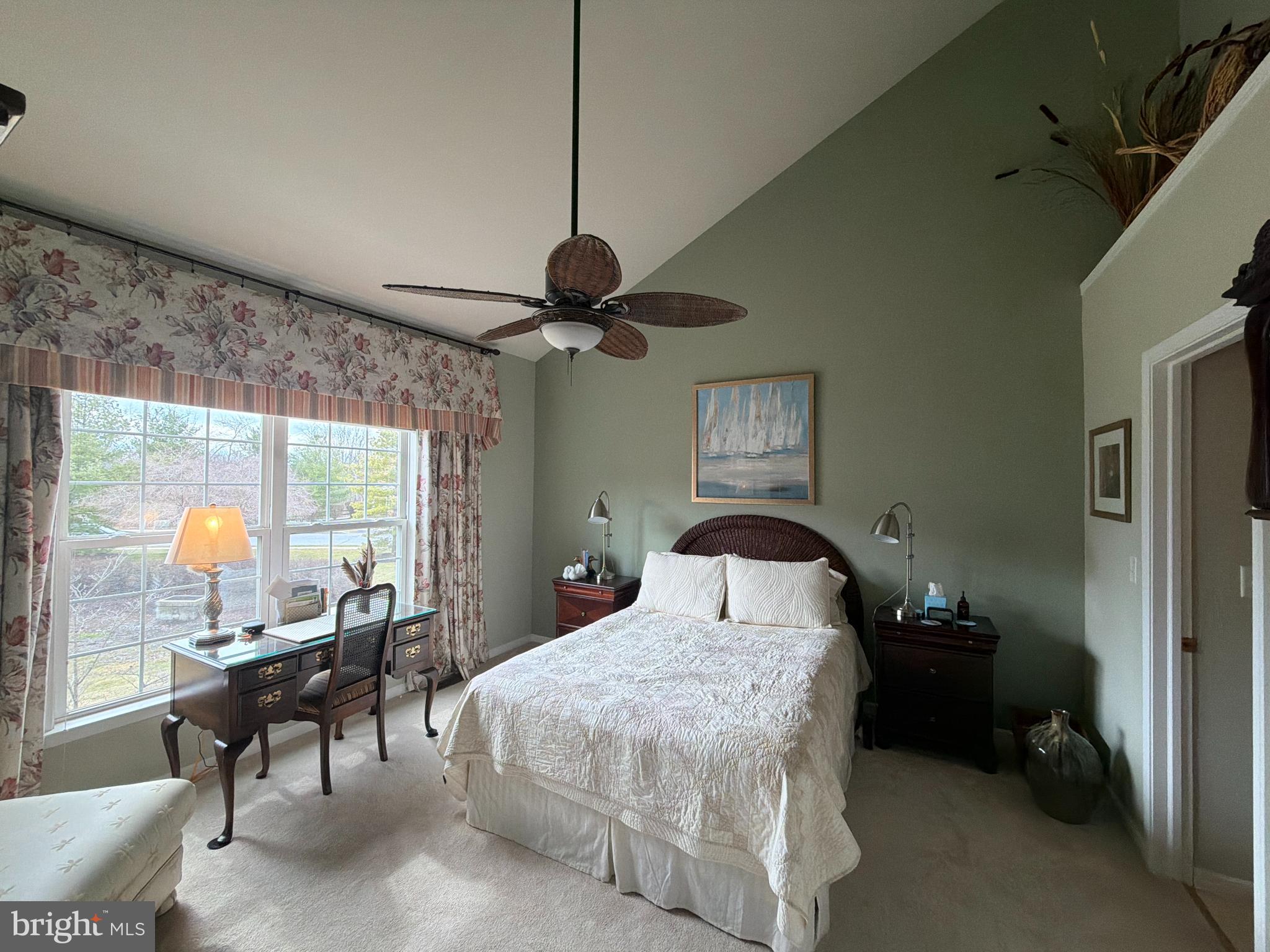 4245 Roth Farm Village Circle Mechanicsburg, PA 17050 - Photo 17 of 42 a bedroom with a bed and a chandelier