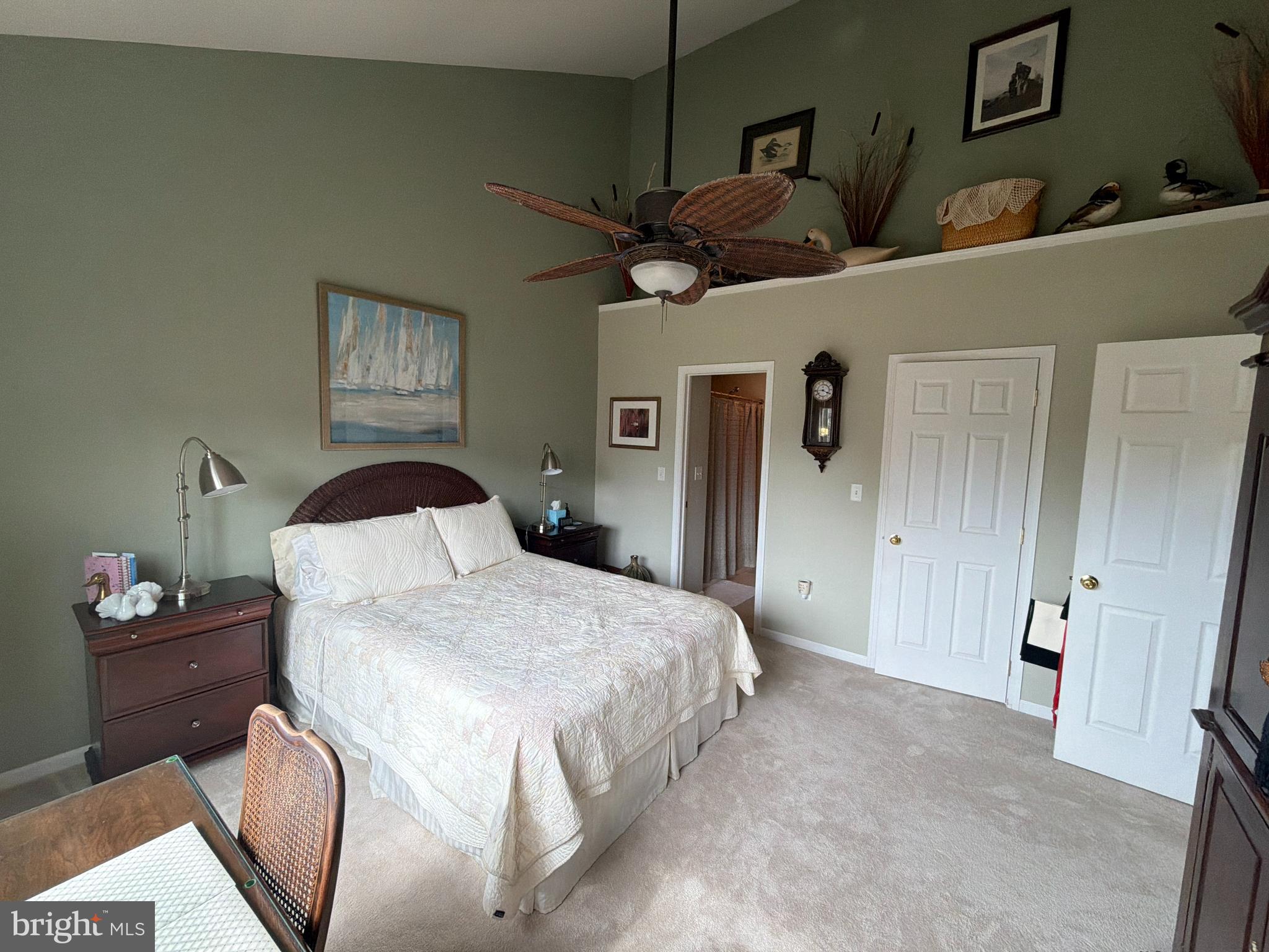 4245 Roth Farm Village Circle Mechanicsburg, PA 17050 - Photo 18 of 42 a spacious bedroom with two beds and a table