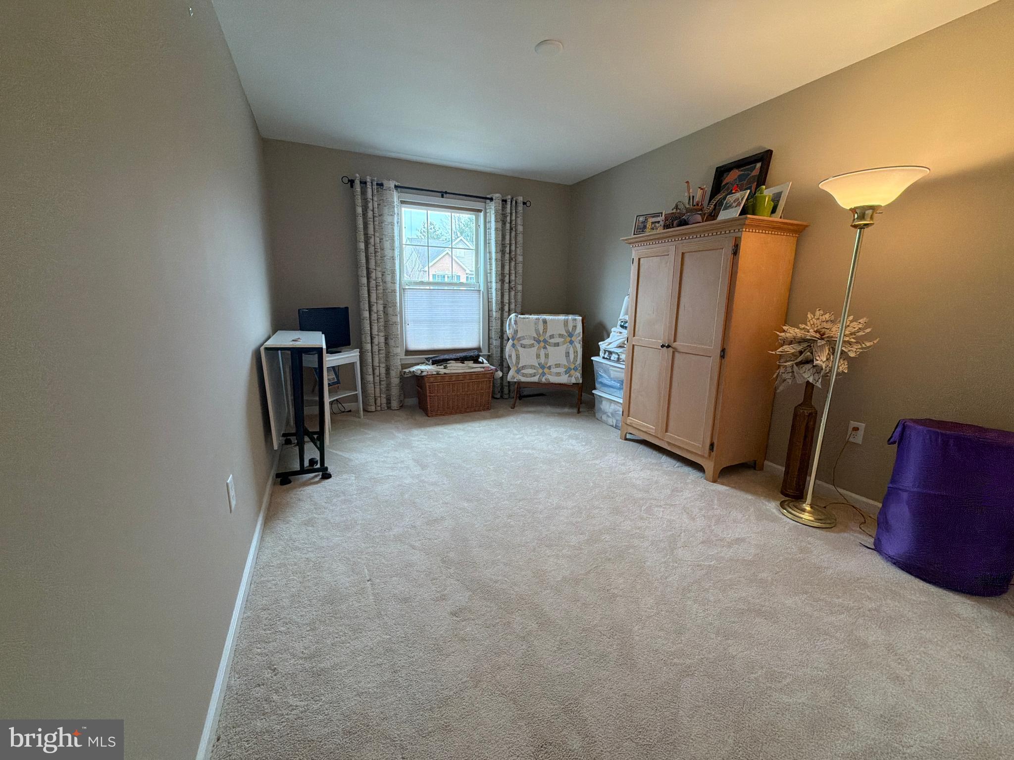 4245 Roth Farm Village Circle Mechanicsburg, PA 17050 - Photo 32 of 42 a view of livingroom with furniture and a window