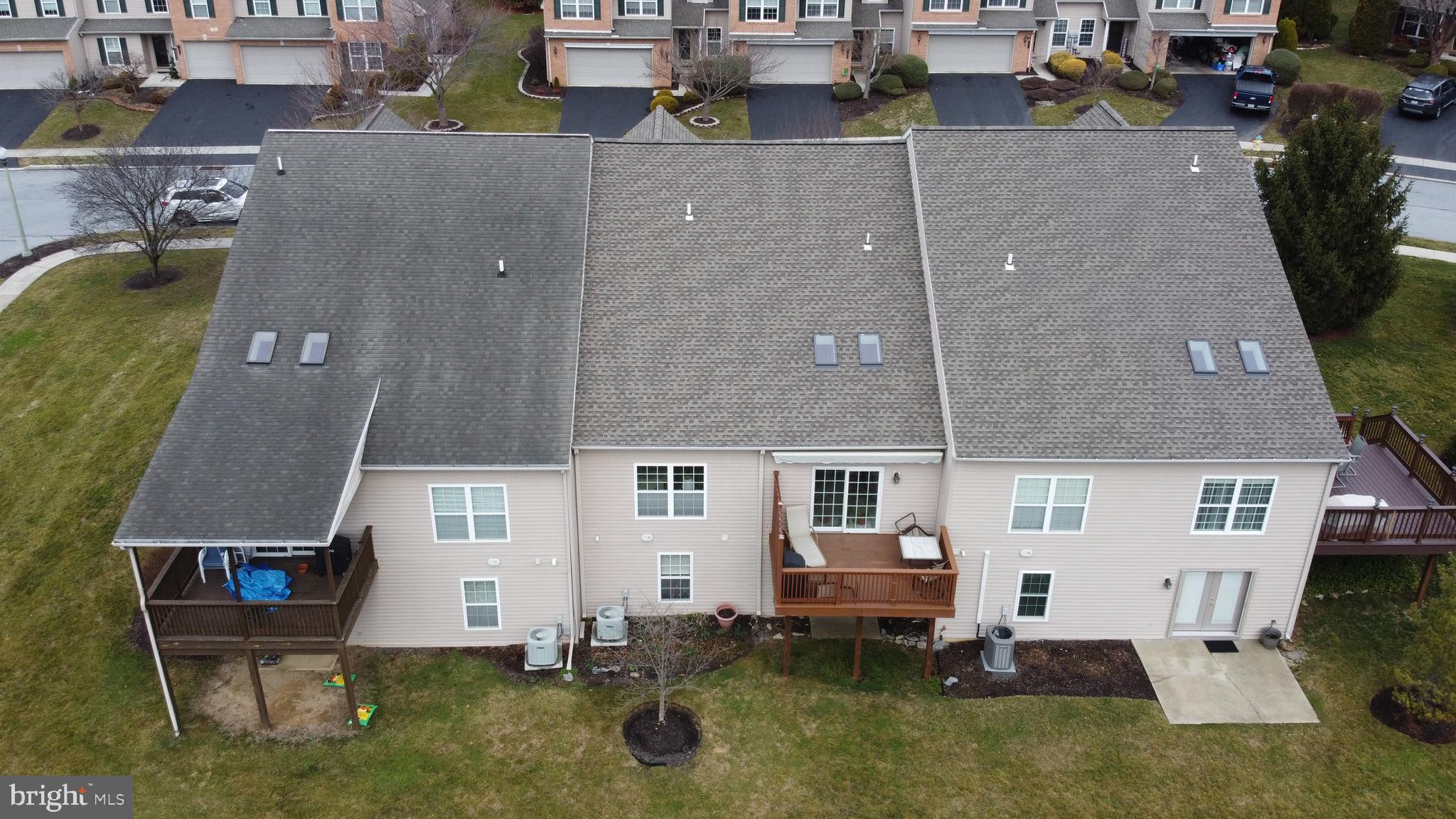 4245 Roth Farm Village Circle Mechanicsburg, PA 17050 - Photo 38 of 42 an aerial view of a house with a yard