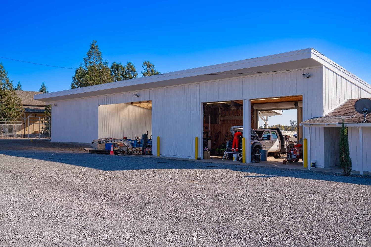 2208 Olivet Road Santa Rosa, CA 95401 - Photo 20 of 65 a view of a garage with rack and bicycle