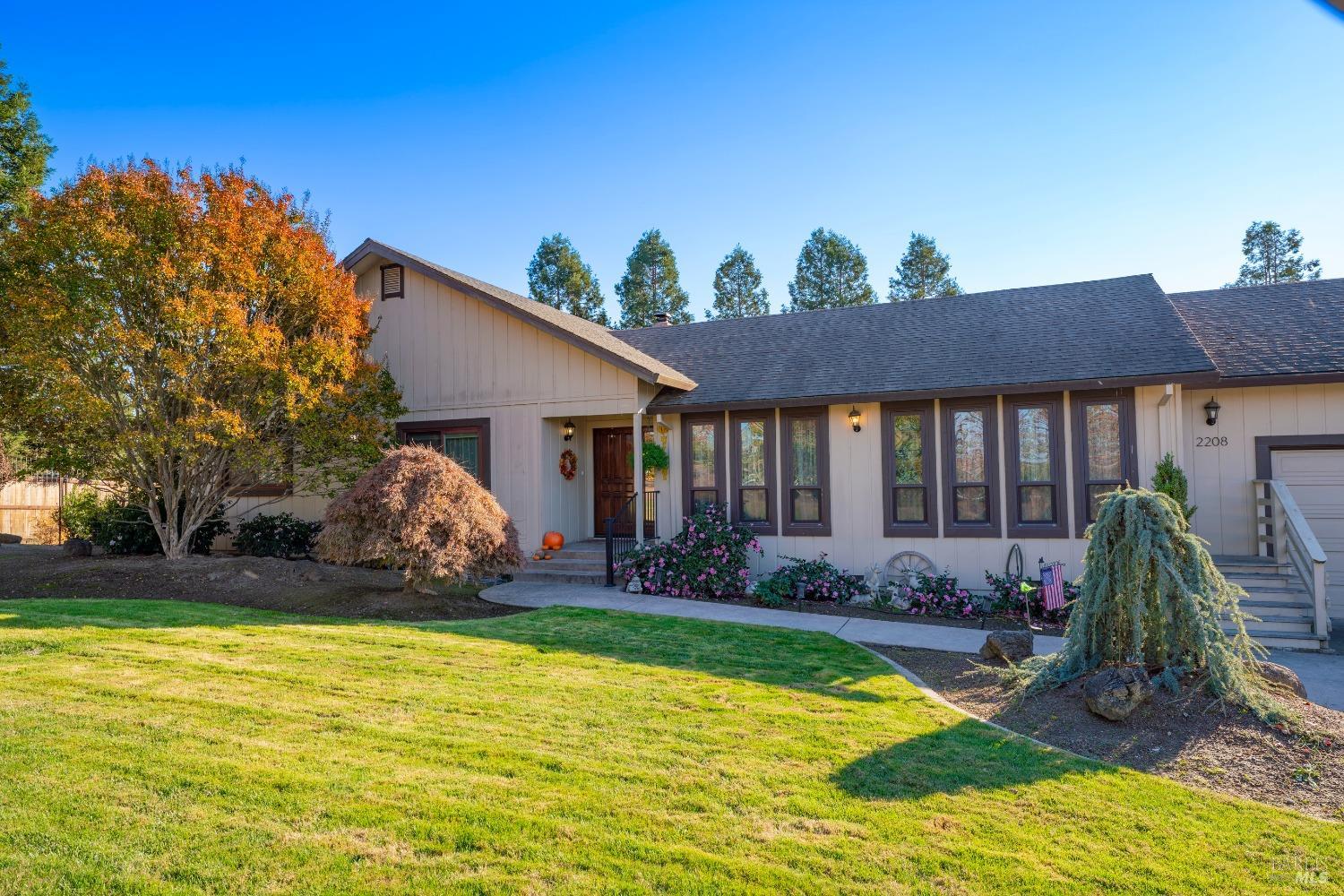 2208 Olivet Road Santa Rosa, CA 95401 - Photo 51 of 65 a view of a house with backyard porch and sitting area