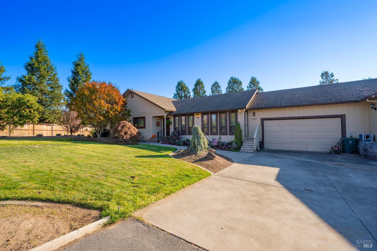 2208 Olivet Road Santa Rosa, CA 95401 - Photo 53 of 65 a view of a house with backyard porch and sitting area