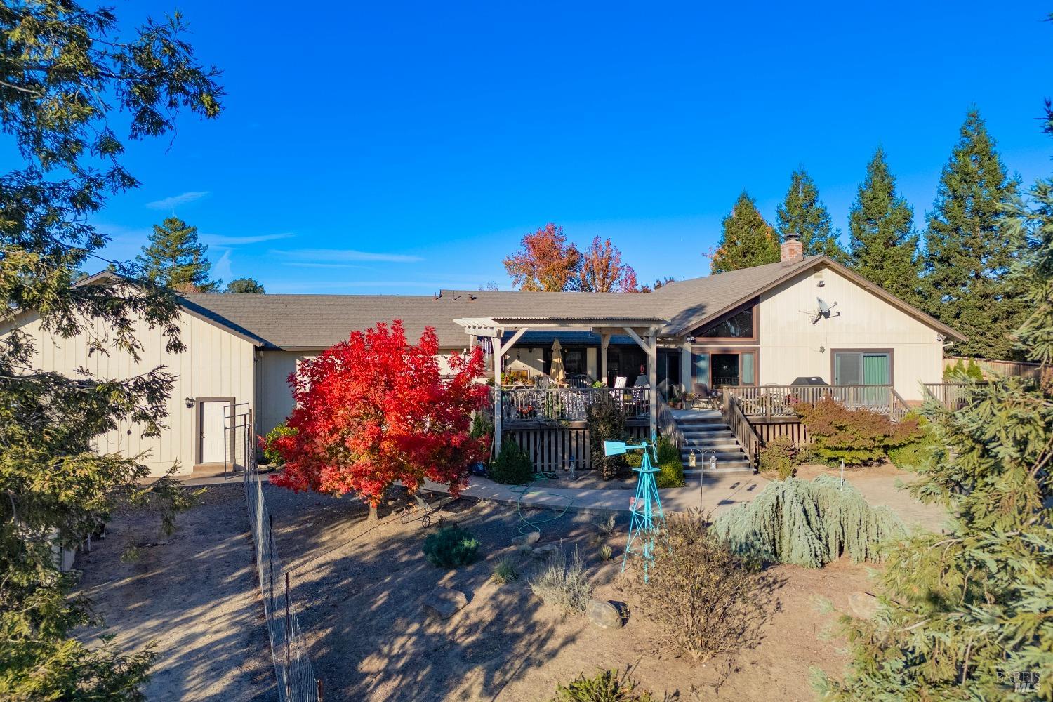 2208 Olivet Road Santa Rosa, CA 95401 - Photo 64 of 65 a front view of a house with a yard