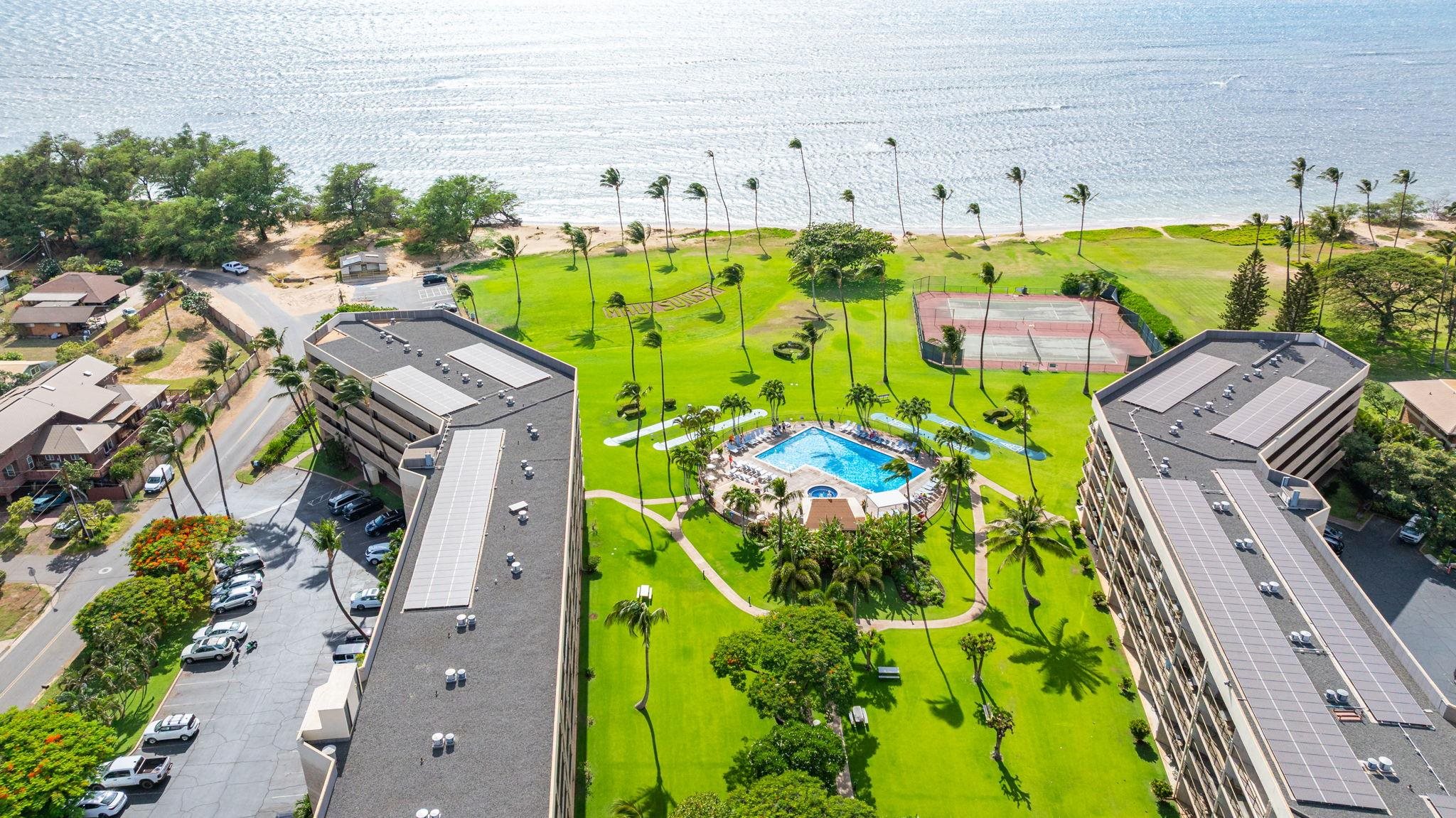 1032 South Kihei Road, Unit A412 Kihei, HI 96753 - Photo 36 of 43 a aerial view of a house with a swimming pool