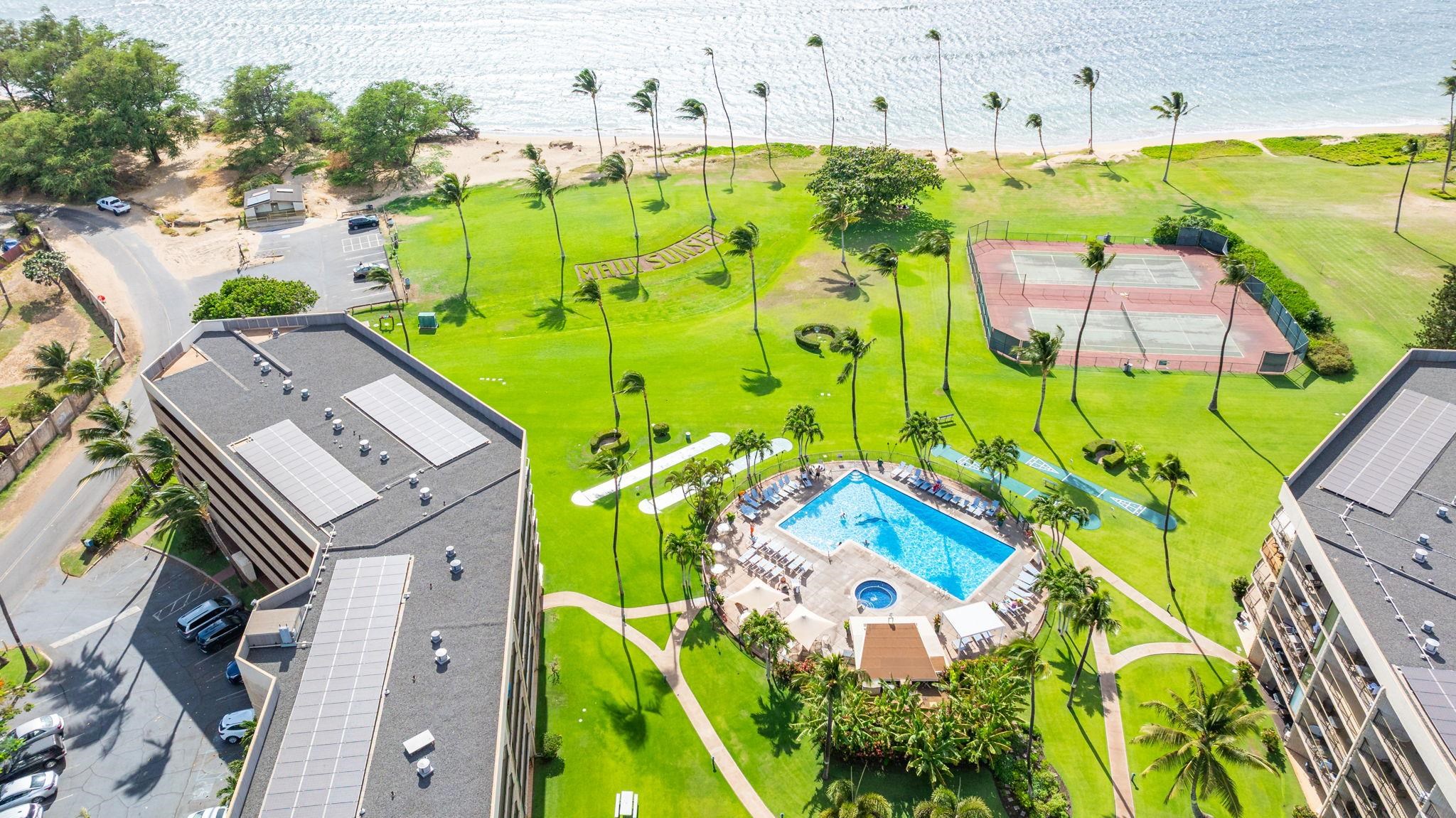 1032 South Kihei Road, Unit A412 Kihei, HI 96753 - Photo 37 of 43 an aerial view of a pool patio swimming pool and outdoor seating