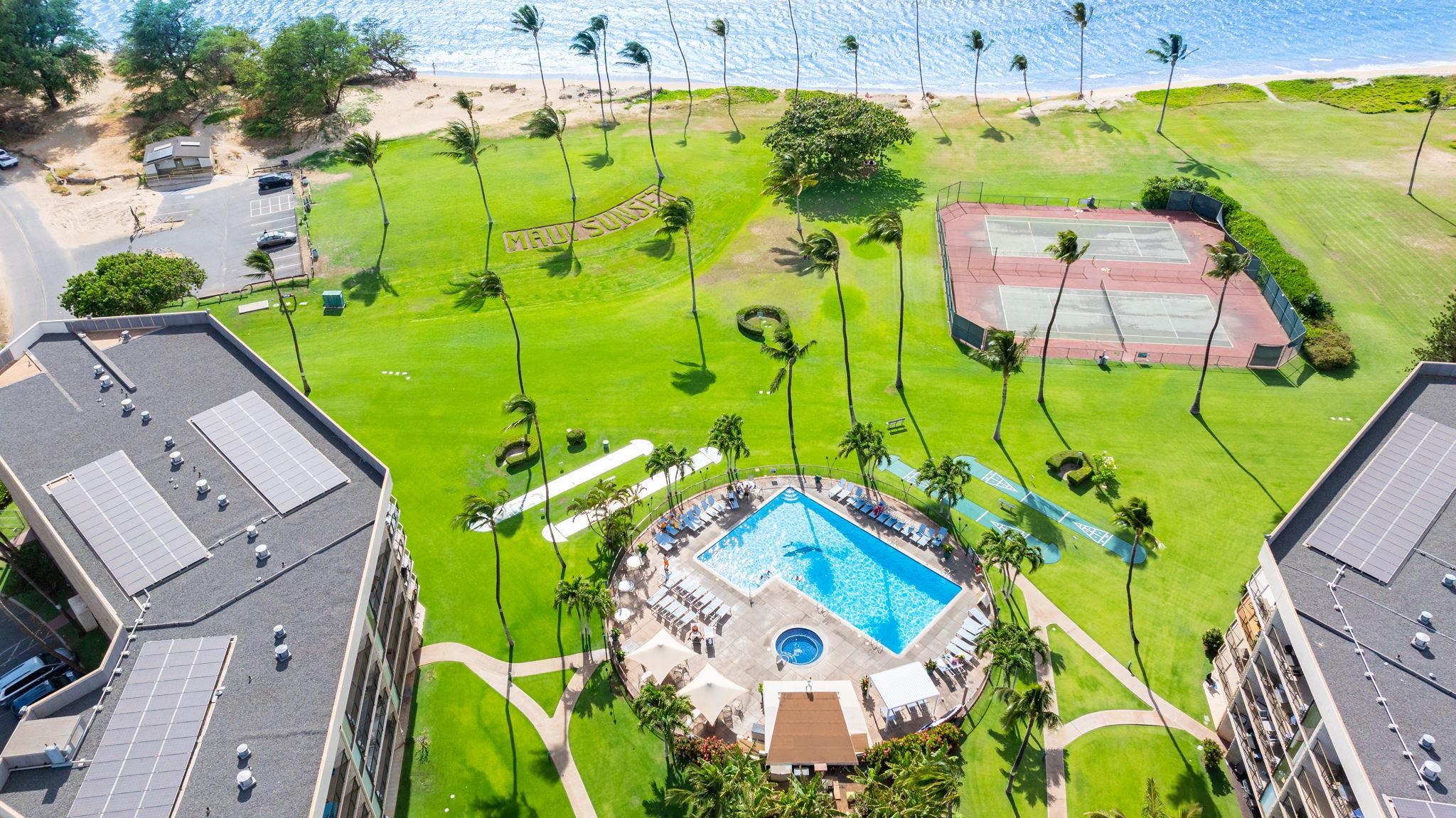 1032 South Kihei Road, Unit A412 Kihei, HI 96753 - Photo 38 of 43 an aerial view of a house with a swimming pool