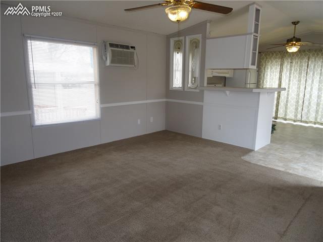 3405 Sinton Road, Unit 233 Colorado Springs, CO 80907 - Photo 22 of 22 Nice, bright, open area. Just waiting for your touches.