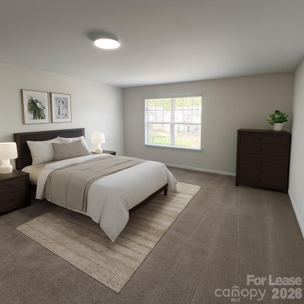 1266 Nesters Store Place Southwest Concord, NC 28027 - Photo 14 of 30 a bedroom with a bed and window