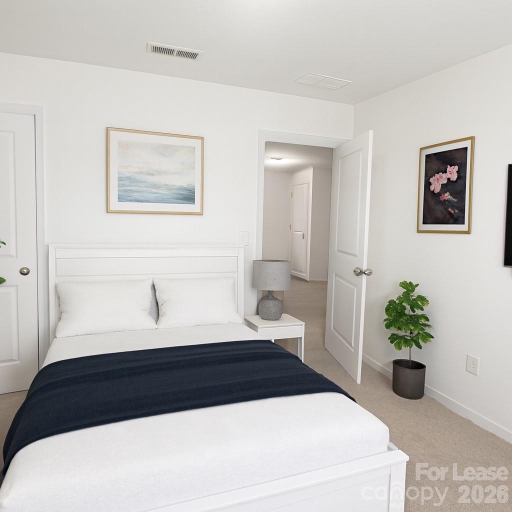 1266 Nesters Store Place Southwest Concord, NC 28027 - Photo 19 of 30 a bathroom with a bathtub and a potted plant
