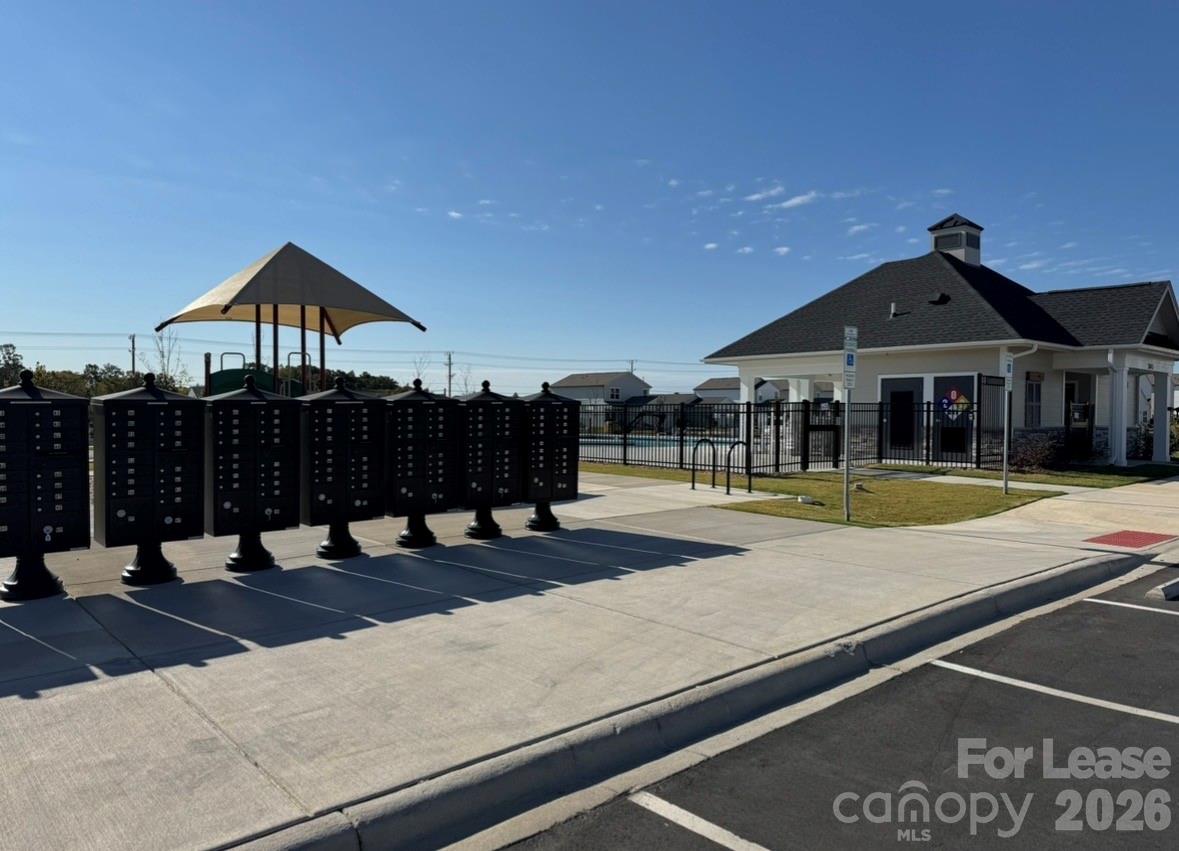 1266 Nesters Store Place Southwest Concord, NC 28027 - Photo 26 of 30 a view of a house with a swimming pool