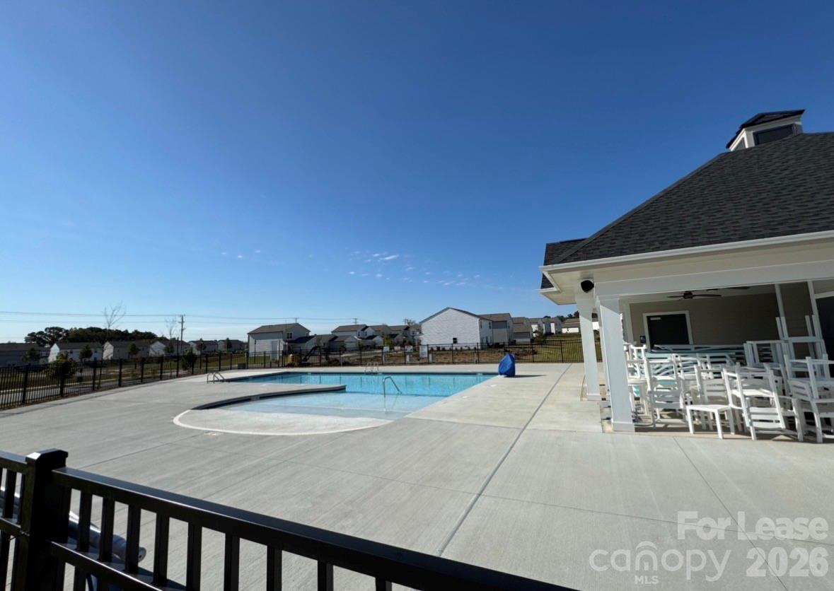 1266 Nesters Store Place Southwest Concord, NC 28027 - Photo 29 of 30 a view of a patio with a table and chairs
