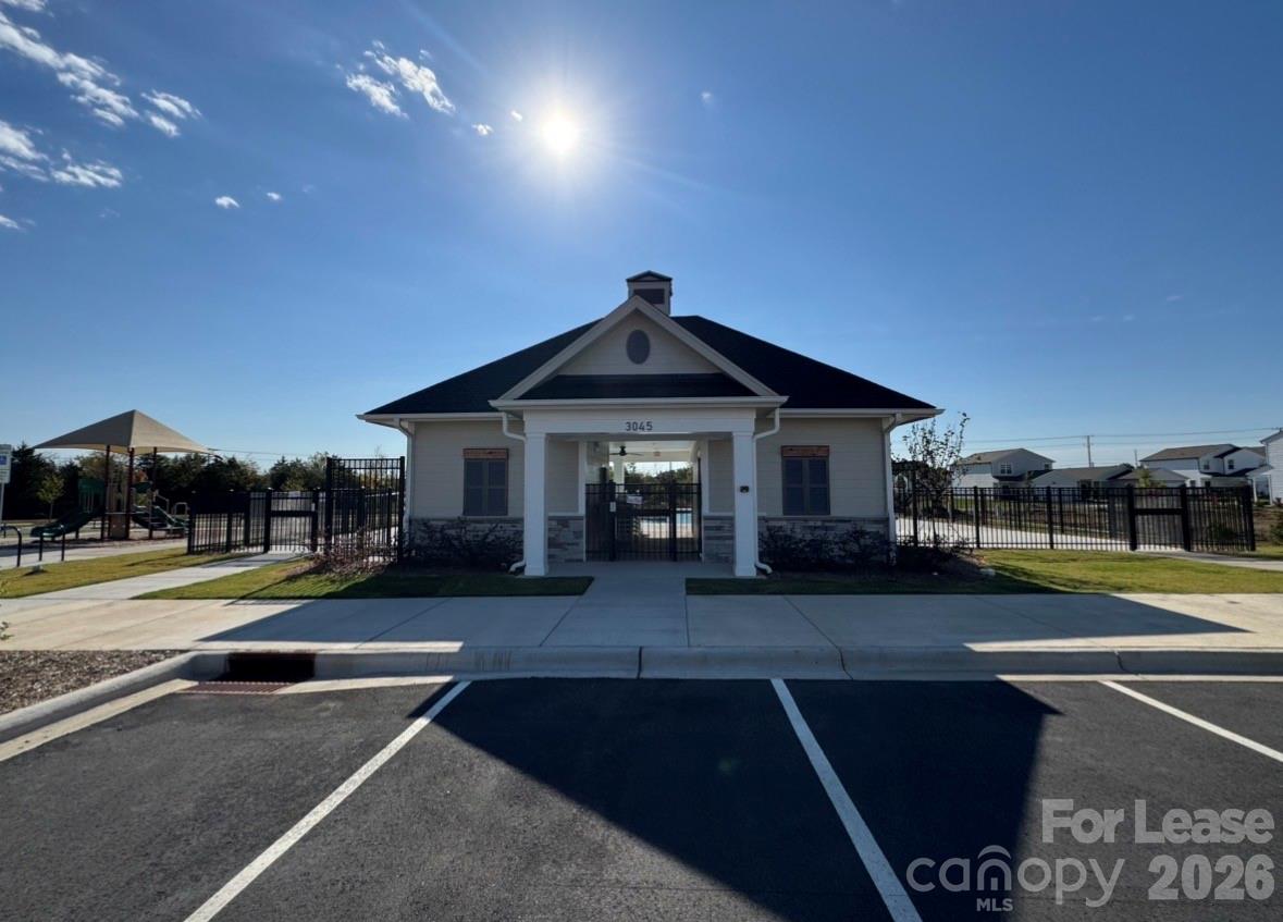 1266 Nesters Store Place Southwest Concord, NC 28027 - Photo 30 of 30 a front view of a house with a yard