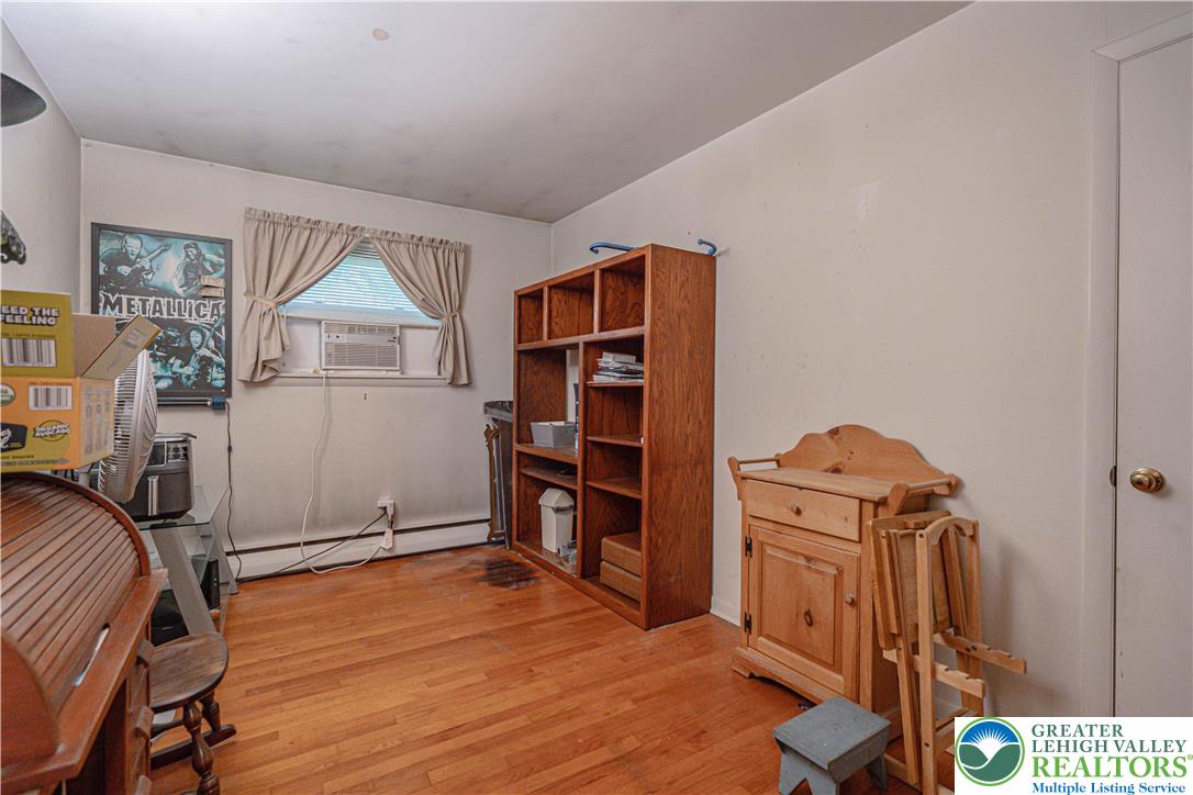 7562 Quarry Road Macungie, PA 18062 - Photo 25 of 35 a view of a livingroom with furniture and an empty room