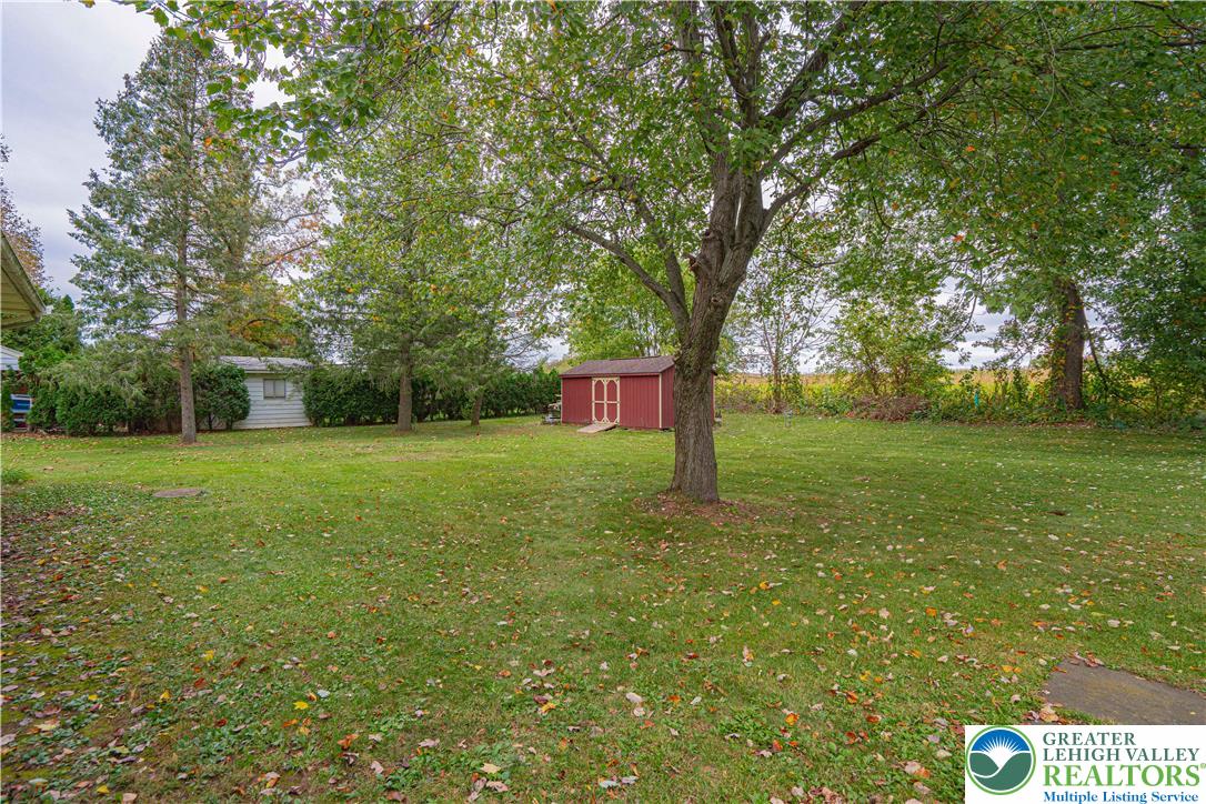 7562 Quarry Road Macungie, PA 18062 - Photo 27 of 35 a view of a trees in front of a house