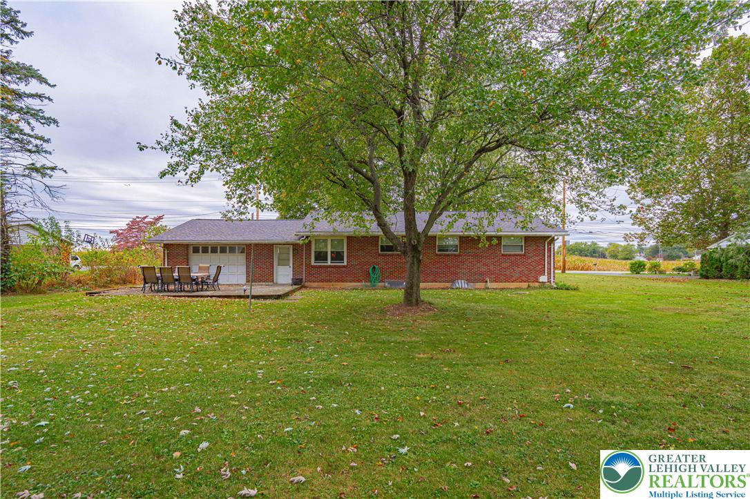 7562 Quarry Road Macungie, PA 18062 - Photo 29 of 35 a view of a house with a big yard
