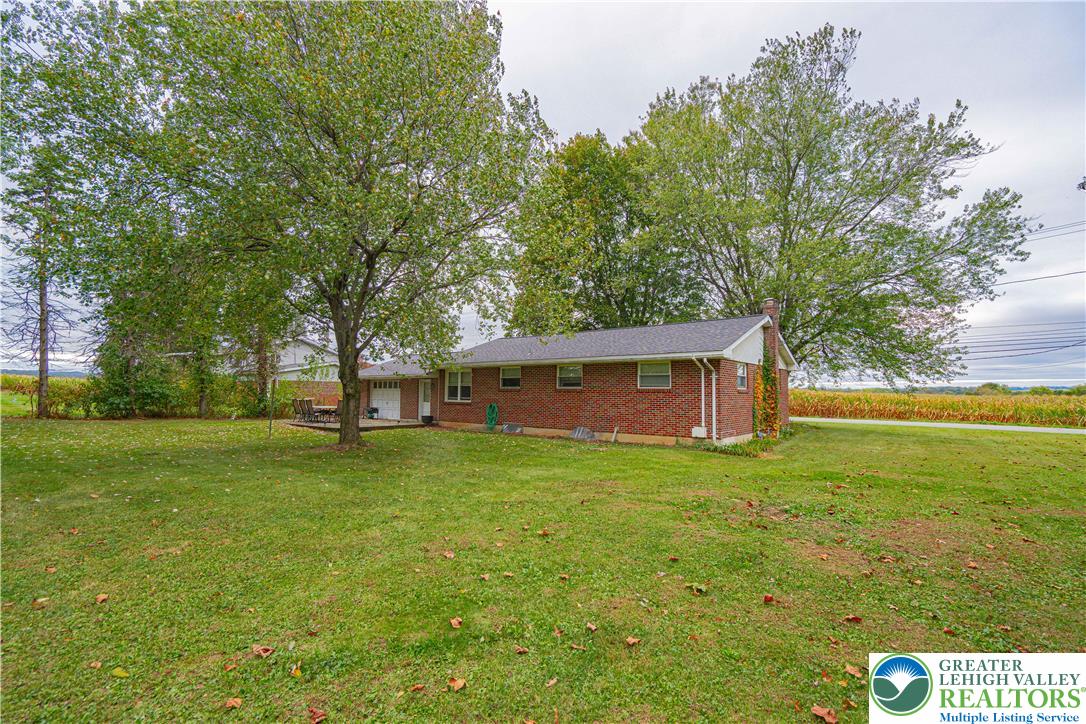 7562 Quarry Road Macungie, PA 18062 - Photo 30 of 35 a view of a house with a yard