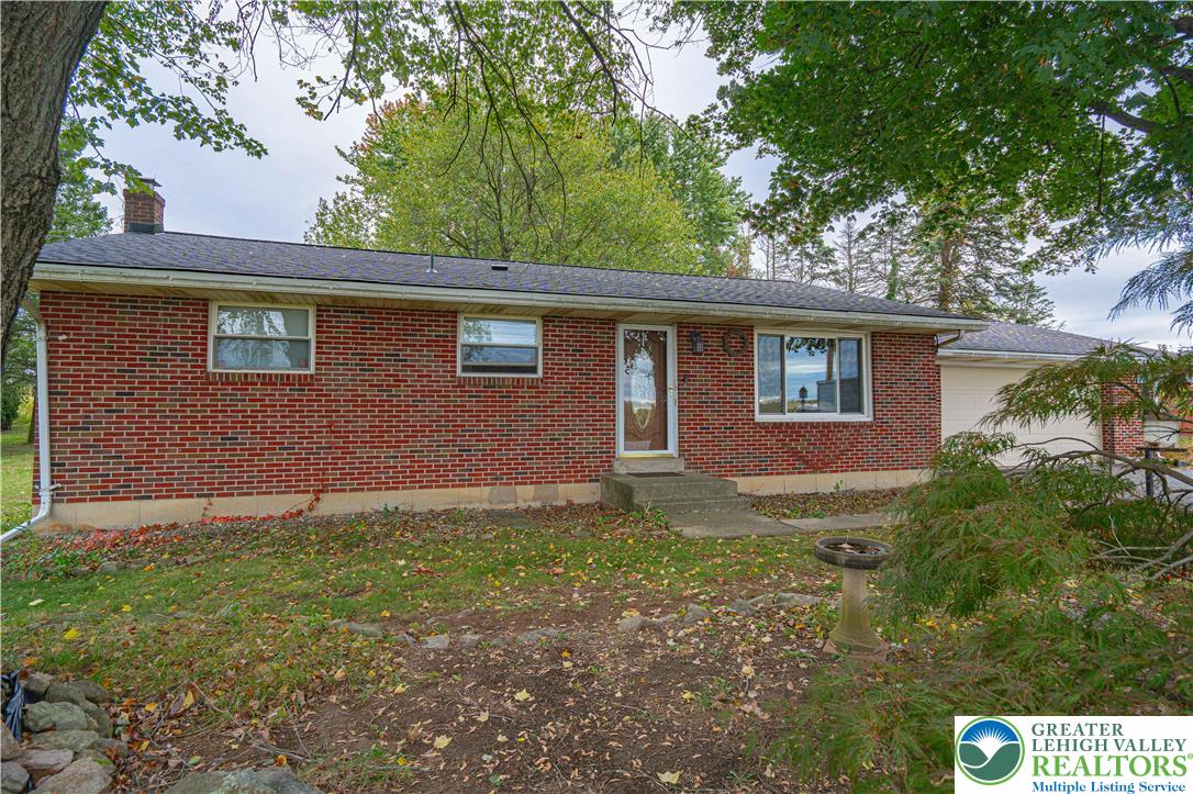 7562 Quarry Road Macungie, PA 18062 - Photo 6 of 35 a view of front of a house with a yard