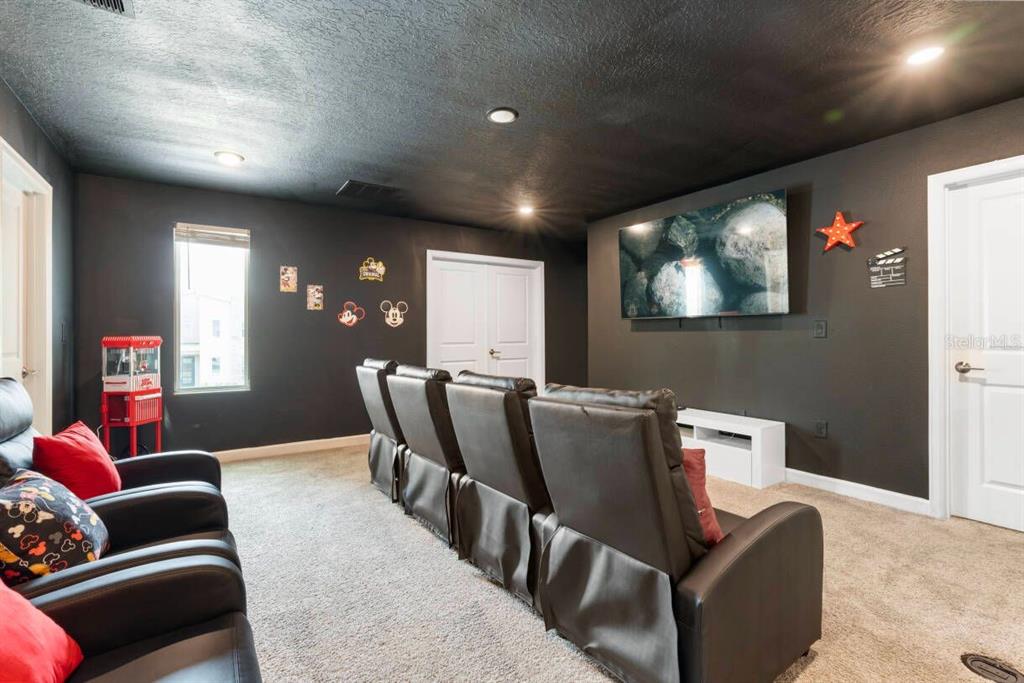 4541 Target Boulevard Kissimmee, FL 34746 - Photo 14 of 33 a living room with furniture and a flat screen tv