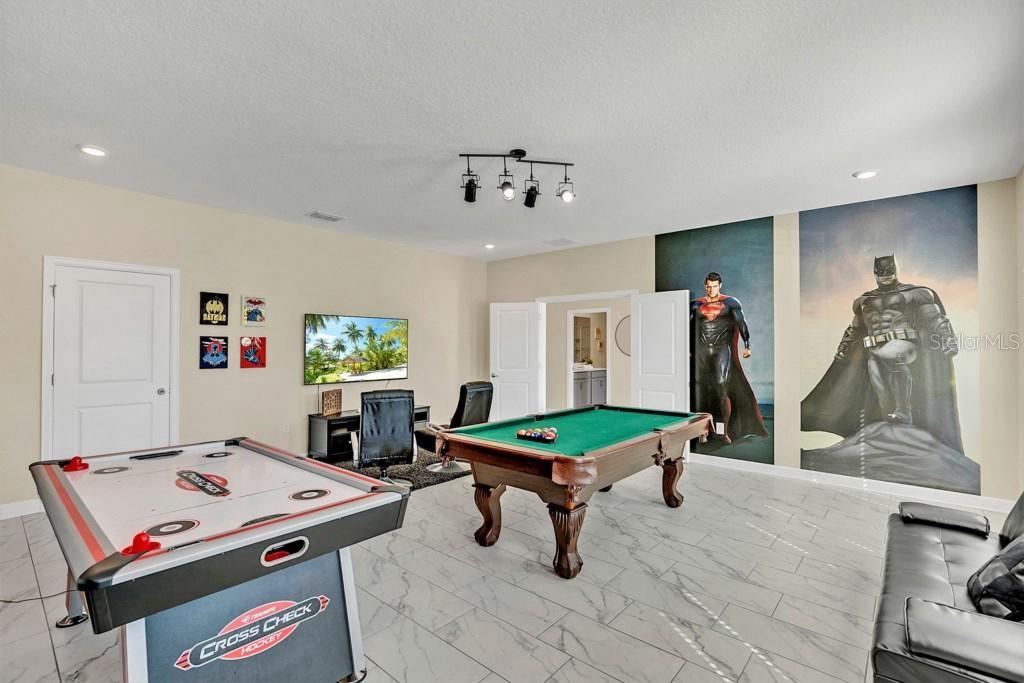 4541 Target Boulevard Kissimmee, FL 34746 - Photo 22 of 33 a living room with furniture and a table