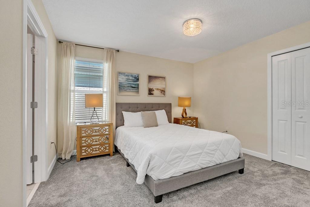 4541 Target Boulevard Kissimmee, FL 34746 - Photo 24 of 33 a bedroom with a bed and a window