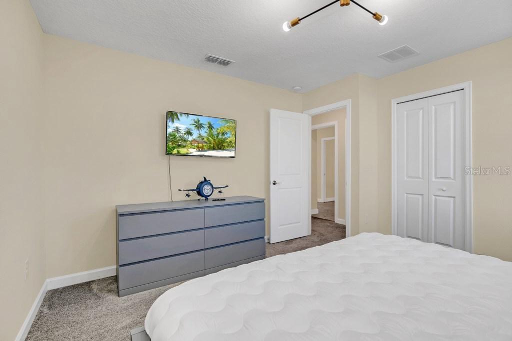 4541 Target Boulevard Kissimmee, FL 34746 - Photo 27 of 33 a bed room with a bed and a window