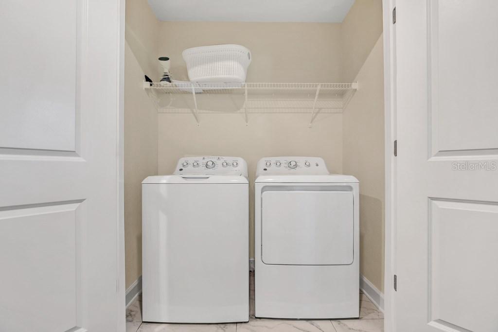 4541 Target Boulevard Kissimmee, FL 34746 - Photo 30 of 33 a utility room with dryer and washer